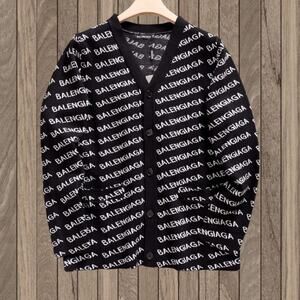 Balenciaga black button down sweater
